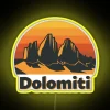 Dramatic Dolomites Mountain Landscape Illuminated by Vibrant RGB LED Sign