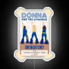 Vibrant RGB neon light box featuring Donna and Dynamos logo.