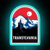 Vampire's Quest: Mysterious Transylvanian Landscapes Illuminated in Neon Glow Style.
