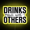 Eye-catching RGB neon bar sign with playful 'Drinks Well' phrase