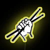 LED drumsticks display in vibrant colorful neon effects lighting