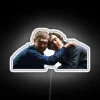 Whimsical LED signs with drunk Sherlock Holmes and friend characters