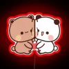 Whimsical DuDu Bear and BuBu Panda's endearing love story sign
