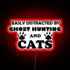 Neon sign for ghost hunters and cat lovers alike
