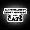 Add quirky humor to your space with this ghost cat sign.