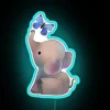 Whimsical Elephant Adorned with Vibrant Butterfly Neon Sign Illumination Design