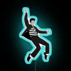 Elvis Presley's iconic 'Jailhouse Rock' pose in bold RGB neon.