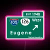 Colorful highway exit sign with vibrant RGB LED lighting