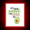 Neon sign advertising extra guacamole with vibrant color accents.