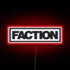 Neon RGB lights illuminating Faction Ski Brand logo and typography