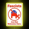 Anti-fascism LED display with vibrant RGB neon colors and message.