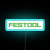 Neon illuminated logo of Festool brand, iconic tool manufacturer signage