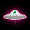 Glowing spaceship logo decor with colorful neon lights and peaceful vibe