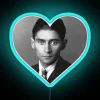 Franz Kafka inspired heart shaped neon sign with colorful glowing letters