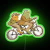 Whimsical frog and toad friendship bike ride inspired neon light.