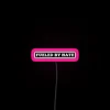 Vibrant RGB neon sign fueled by darkness and rebellion vibe