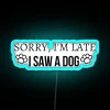 Vibrant RGB neon sign featuring humorous 'Sorry I'm late dog' design.