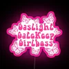 Empowering feminist phrase in bright, multicolor LED neon light display.