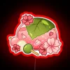 Vibrant glass sakura mochi inspired neon sign with colorful accents.