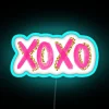 Neon Love Sign with Glowing Gold XOXO Letters and Symbols