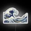 Vibrant RGB LED neon art reproduction of classic Hokusai wave design