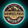 Brightly lit nostalgic travel sign featuring iconic Swiss Alpine mountain route