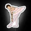 Neon Sign Featuring Harry Styles in Elegant Balletic Dance Pose.
