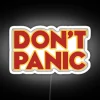 Vibrant Neon Hitchhiker Galaxy Sign with Don't Panic Distressed Color Accents
