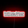 Motivational retrofuturistic humor meets mental health awareness in neon signage.