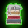 Vibrant cat-inspired neon decor adds cozy ambiance to modern spaces.