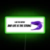 Vibrant RGB Neon Sign Featuring Humorous Philosophical Quote and Worm String
