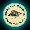 Vibrant neon 'I Brake For Critters' animal lover wall decor accent.