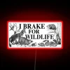 Neon Wildlife Warning Sign for Outdoor Enthusiasts with Humor and Color