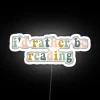 Colorful Neon Sign Reads 'I'd Rather Be Reading' in RGB.