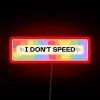 Slow Down, I Don't Speed, Cautioning Motorists with Colorful Warning Sign