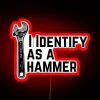 Personalized non-binary identity statement in vibrant RGB neon lighting.