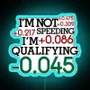 Retro gaming-inspired 'I'm Not Speeding I'm Qualifying' 4-color neon decoration.