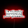 Discreetly corrects grammatical mistakes with a dash of edgy humor