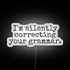 Grammar Police at Work: Meticulously Correcting Your Errors in Neon Letters