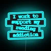 Neon quote lamp supporting book lovers and their reading obsession.