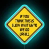 Amusing slow vehicle warning sign with humorous uphill humor statement