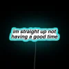 Vibrant Neon Sign Expressing Reluctance to Not Enjoy Life Momentarily