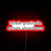 Awaken positivity with vibrant RGB neon signs of mindfulness and abundance.