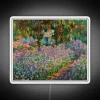 Bright Neon Sign Depicting Whimsical Blooms in Famed Artist's Garden