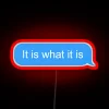 Embracing life's simplicity with bold, colorful 'It Is What It' phrase.