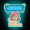 Alcoholic recovery motivational decor featuring colorful neon signs and quotes.