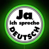 Unique German Neon Sign Decor with Black Background and Colorful Letters