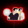 Iconic Friends duo Joey and Chandler in vibrant RGB lighting