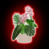 Colorful June bug among lush orchids neon lit decorative sign.