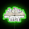 Neon Literary Sign with Book Page Design and Colorful Rainbow Accents